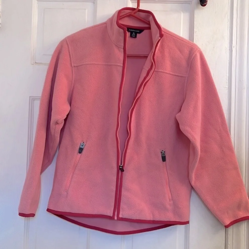 Land’s End girls pink fleece jacket is size medium 10-12